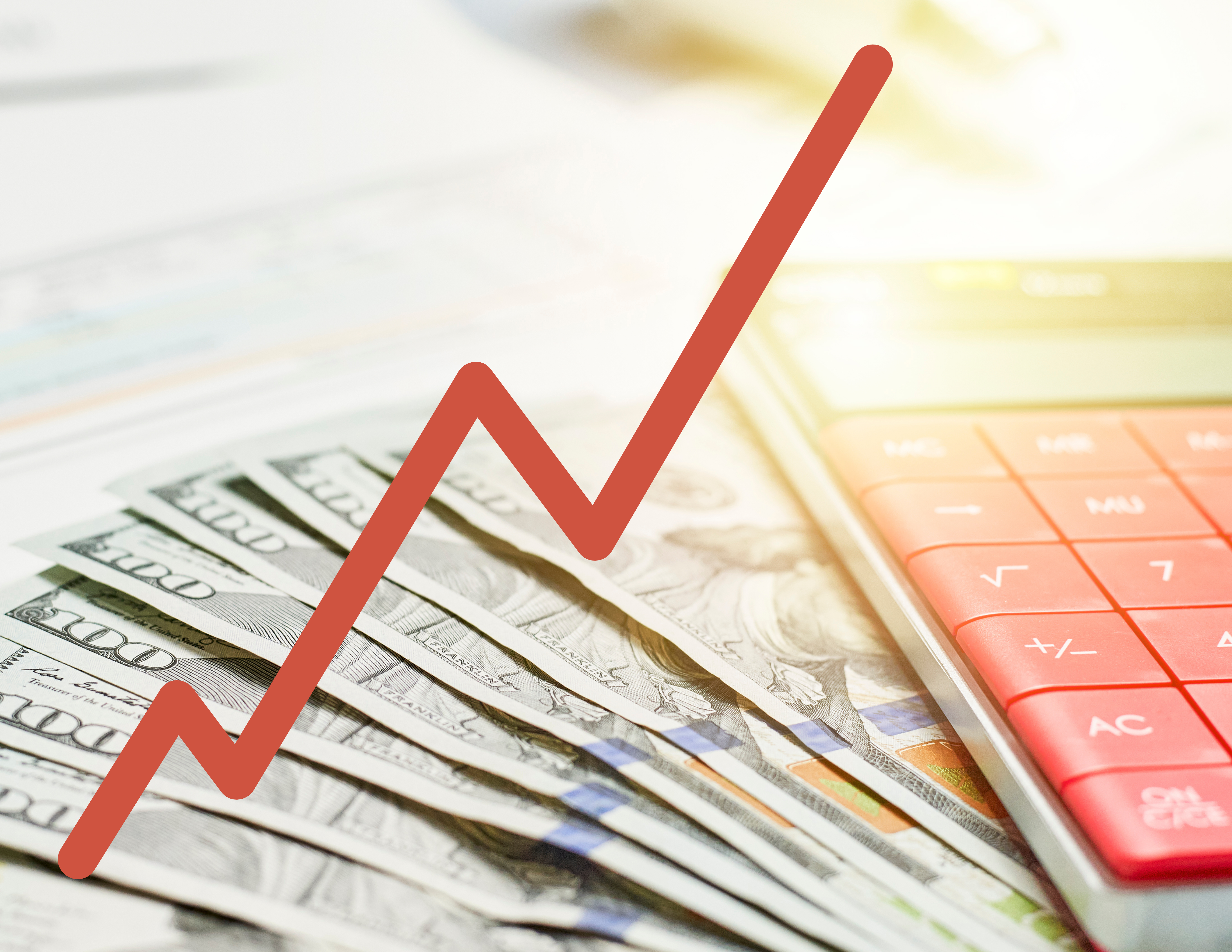 Money and calculator with line chart